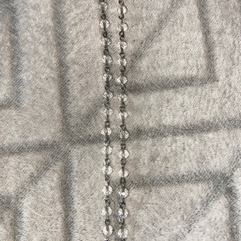 60 inch clear bead necklace with tassel & bling